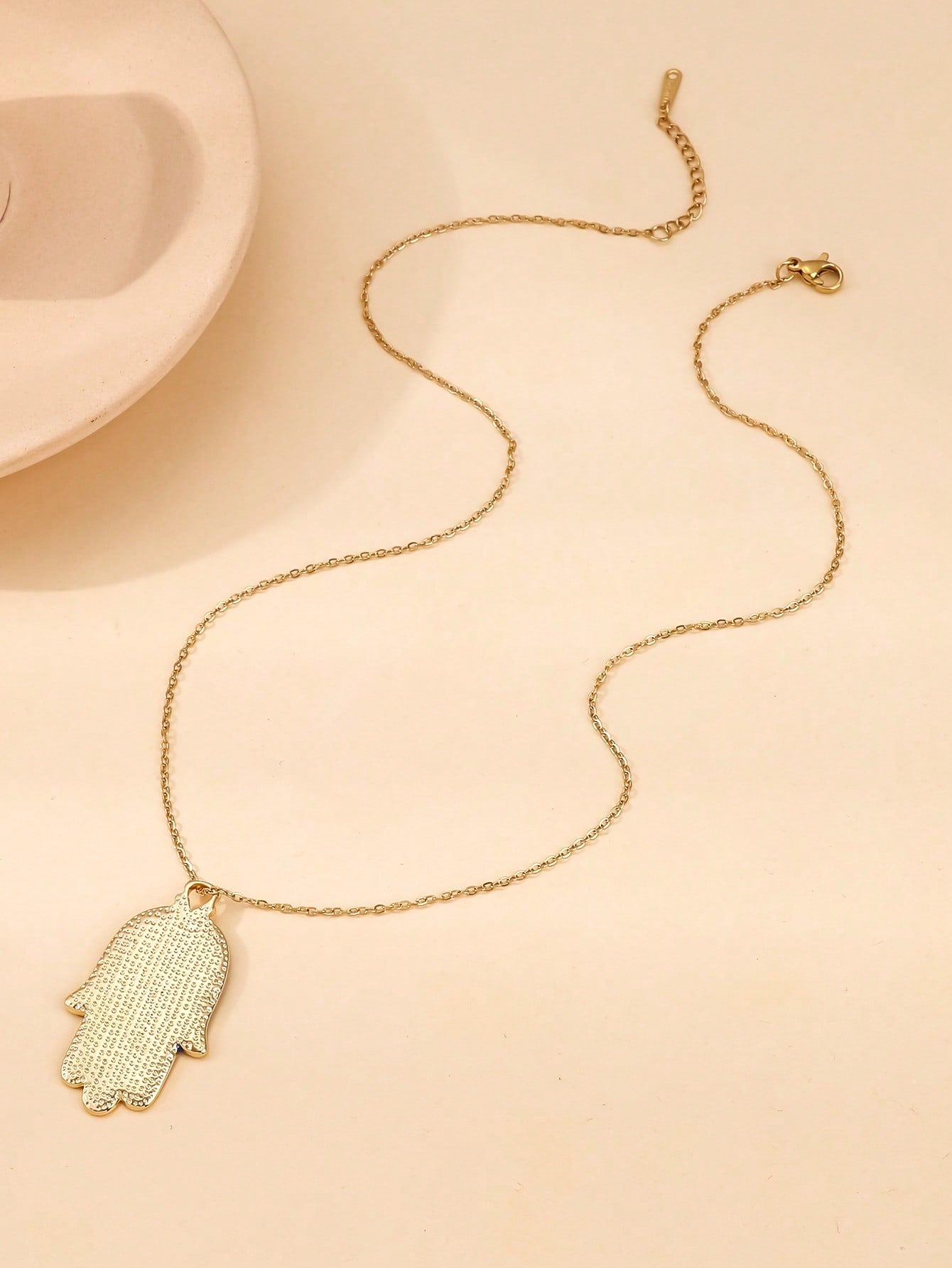 Radiant Hamsa Necklace with Rhinestone Eye