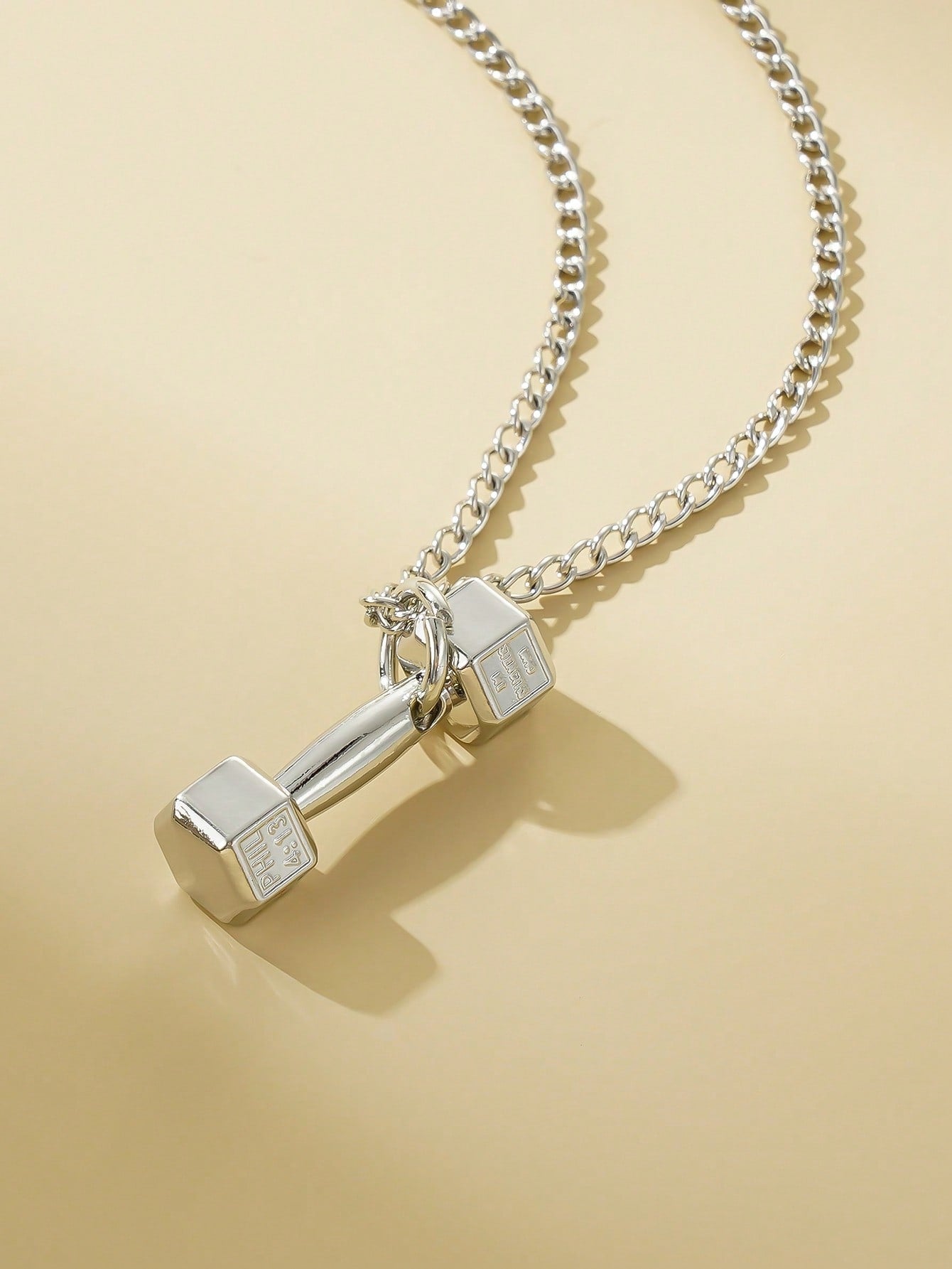 Strength and Style: Men's Fashionable Dumbbell Charm Necklace - Embrace Your Fitness Journey